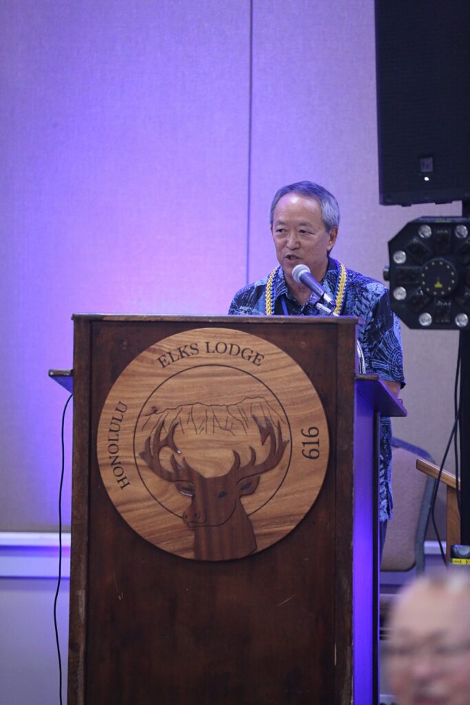 Terry emcees the program