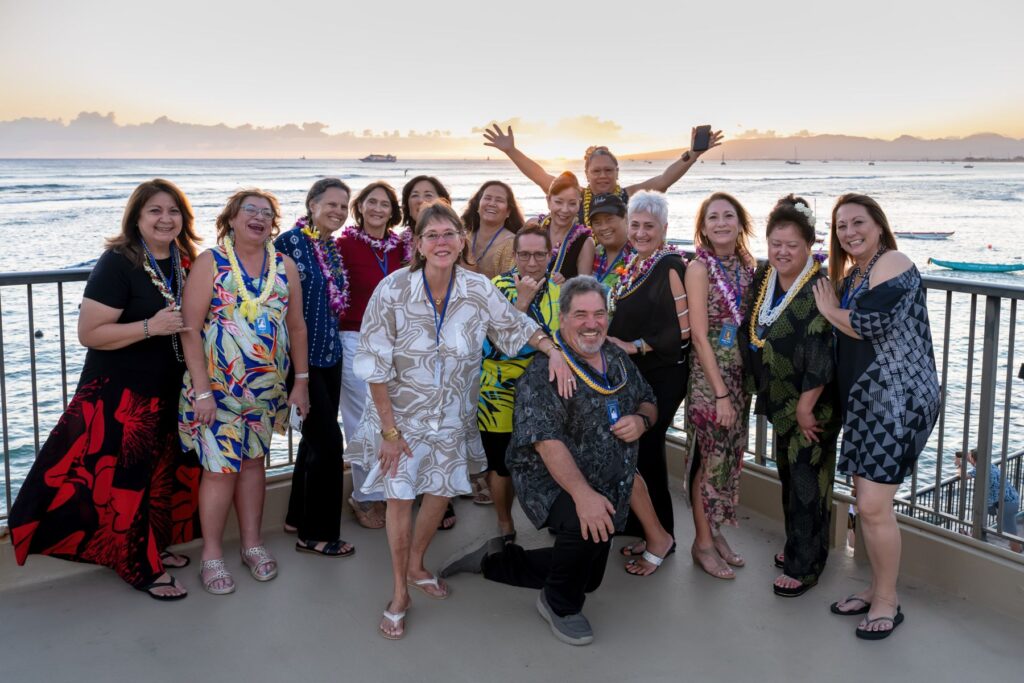Classmates on the lanai at sunset