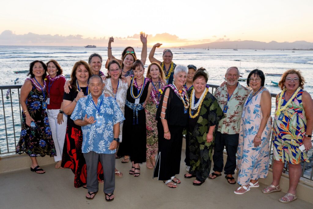 Classmates on the lanai at sunset