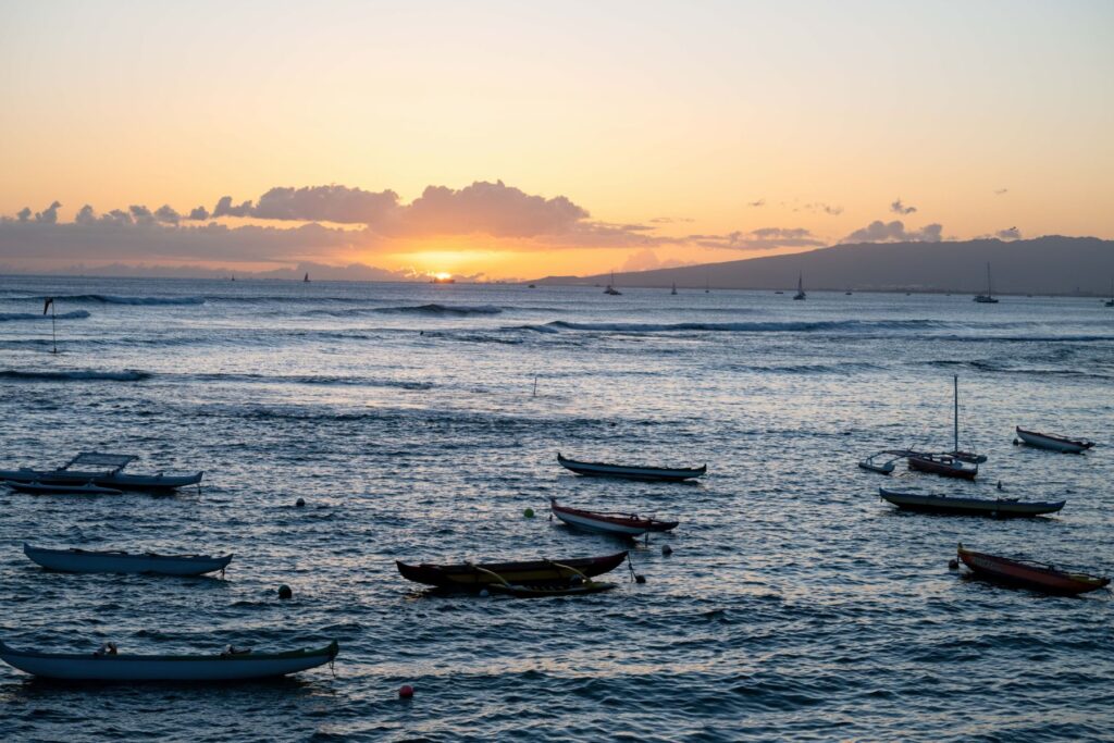 Sunset with canoes in foreground